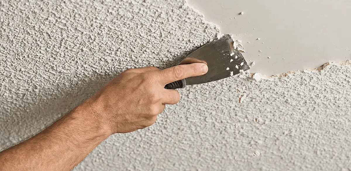 Popcorn ceiling removal scraping off textured ceiling finish in South Bend, IN
