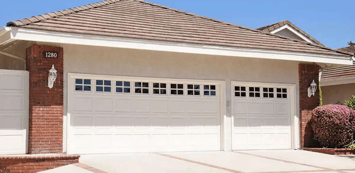 Residential garage door repair service for a double garage door in South Bend, IN