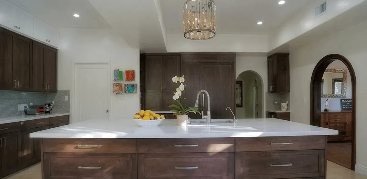 Cabinet refacing project with updated kitchen cabinets and island in South Bend, IN